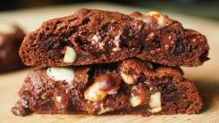 Chocolate cookie with macadamia nuts.
