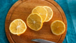 Lemon slices on cutting board