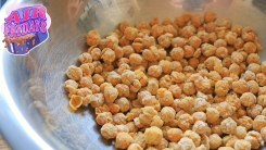 Air fried chickpeas in a metal bowl.