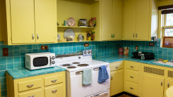 vintage kitchen yellow cabinets green tile