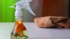 homemade cleaning spray with orange peels
