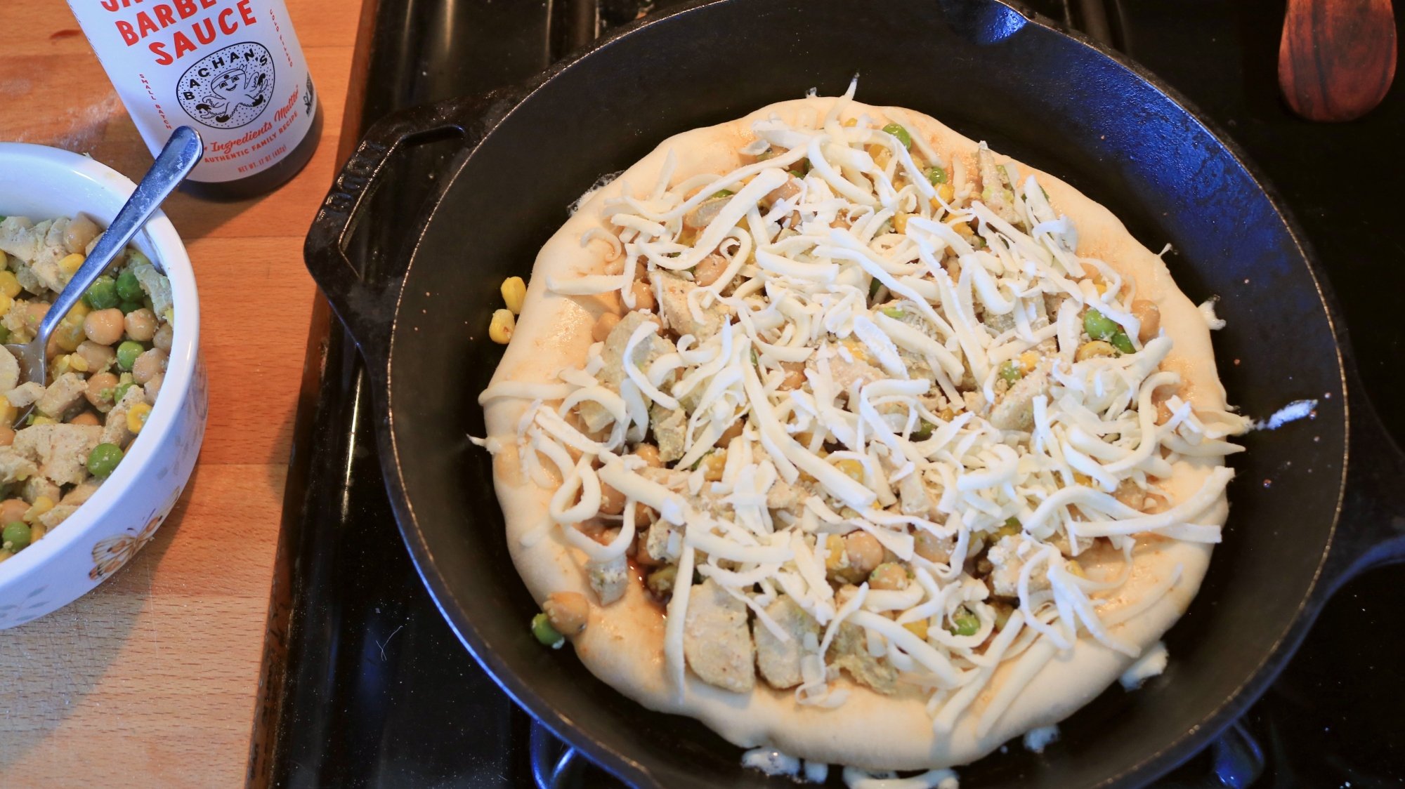 Pizza in a skillet before baking.