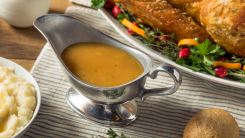 image of gravy boat on thanksgiving dinner table