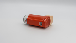 flovent asthma inhaler sitting on a white table
