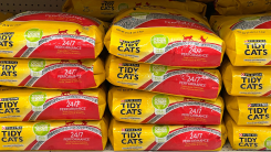 Bags of Tidy Cat cat litter at a store