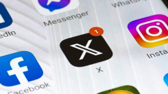 An iPhone displaying the X app logo on its homescreen