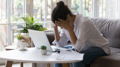 Stressed woman going over finances
