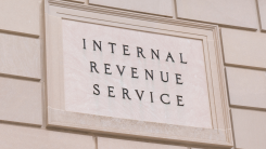 Internal Revenue Service sign on side of IRS building