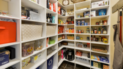 fully stocked walk-in pantry in a home
