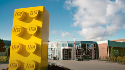 screenshot of outside of LEGO building in documentary trailer