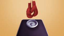 A composite image of a pair of boxing gloves hanging over a bathroom scale