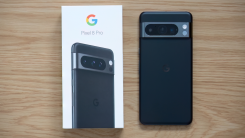 google pixel 8 pro smartphone and its box on a table