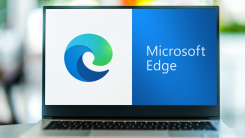 A laptop showing the Microsoft Edge logo