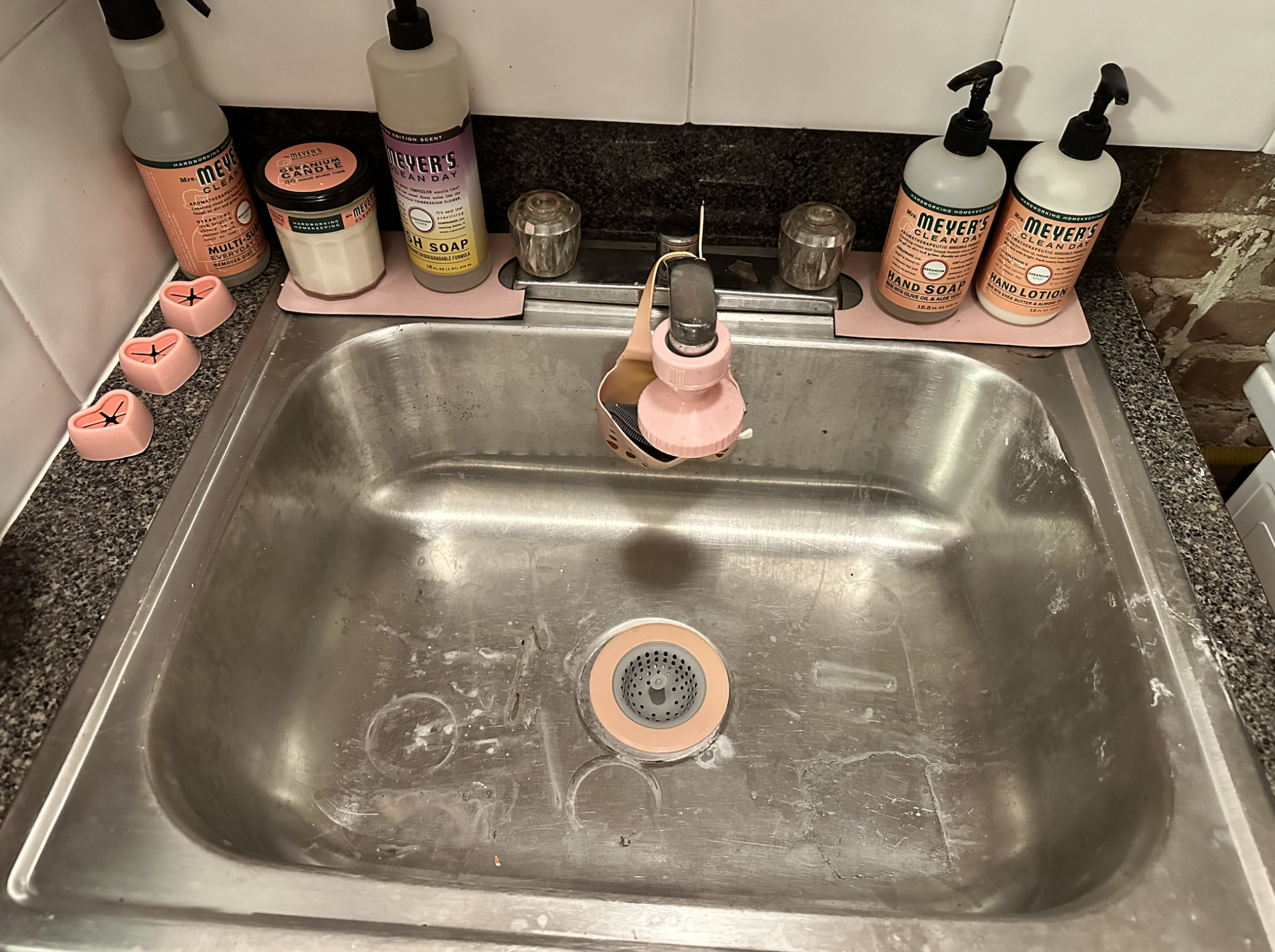 A dirty stainless steel sink